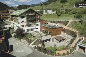 Отель Hotel Schwarzer Adler - Sport & Spa  Санкт-Антон, Арльберг